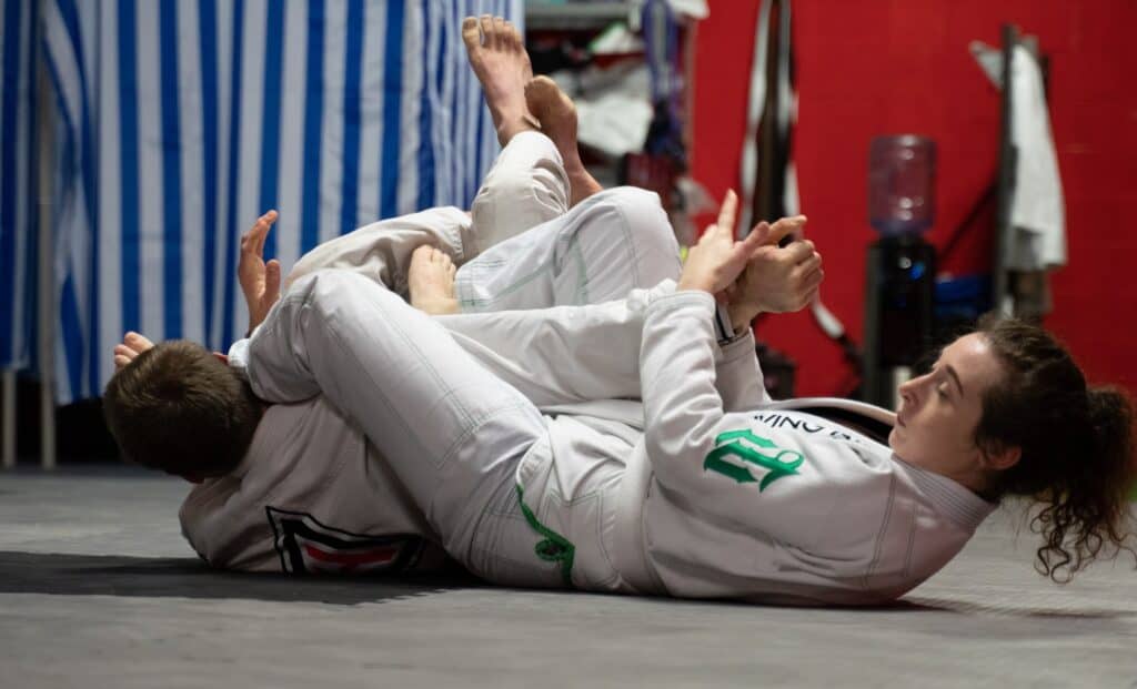 Woman applying arm bar